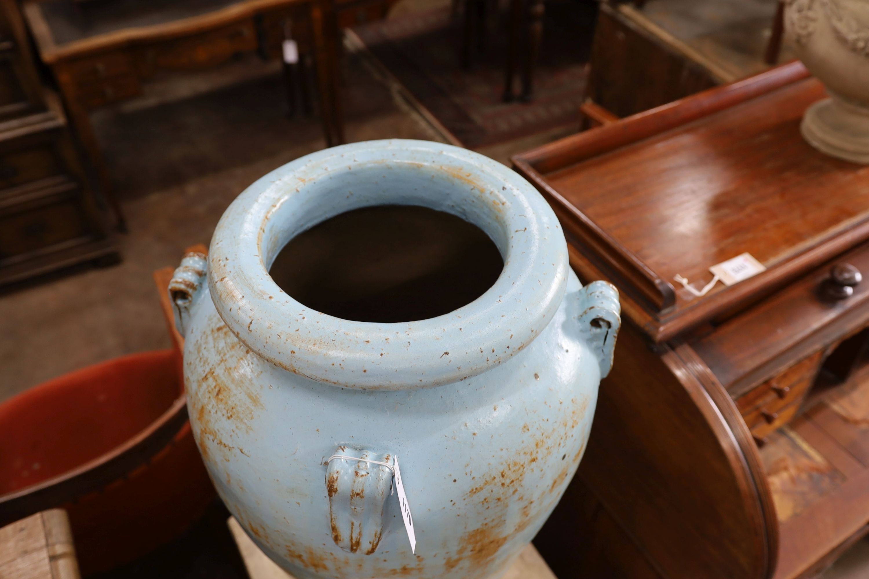 A large blue glazed earthenware garden planter, height 65cm